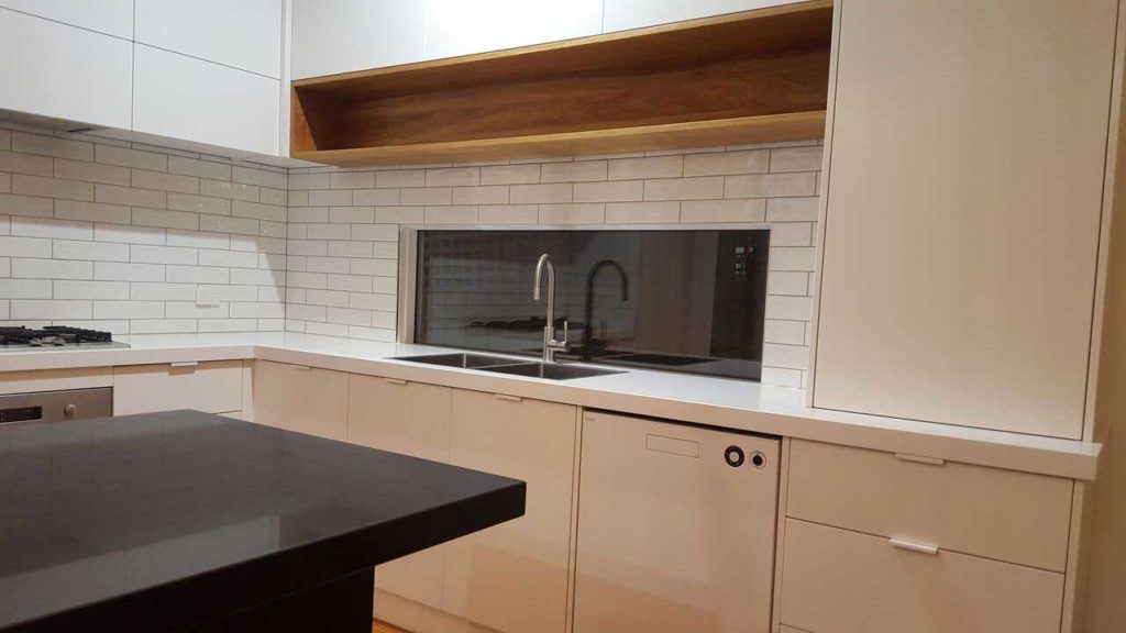 Modern kitchen renovation in Camberwell. Brock, laminate and marble, by Mass Constructions.
