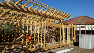 Timber wall and roof frame of the house.