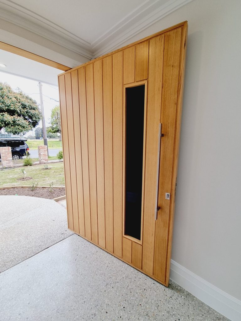 Timber pivot entrance door
